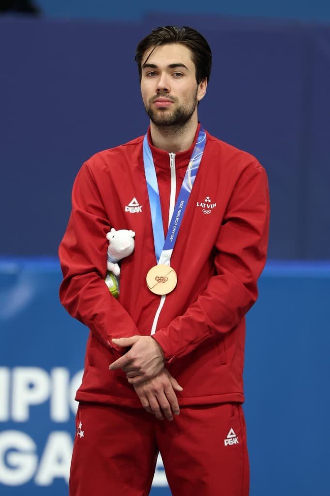 Roberts Krūzbergs ar Olimpisko bronzas medaļu